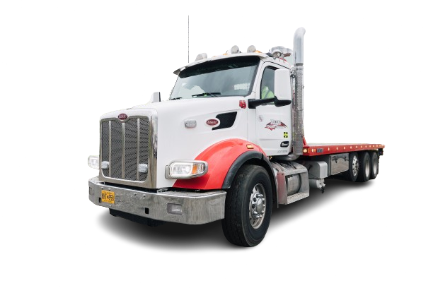 Vulcan Towing Anchorage heavy haul equipment flatbed semi truck available for rental by the hour with operator included.